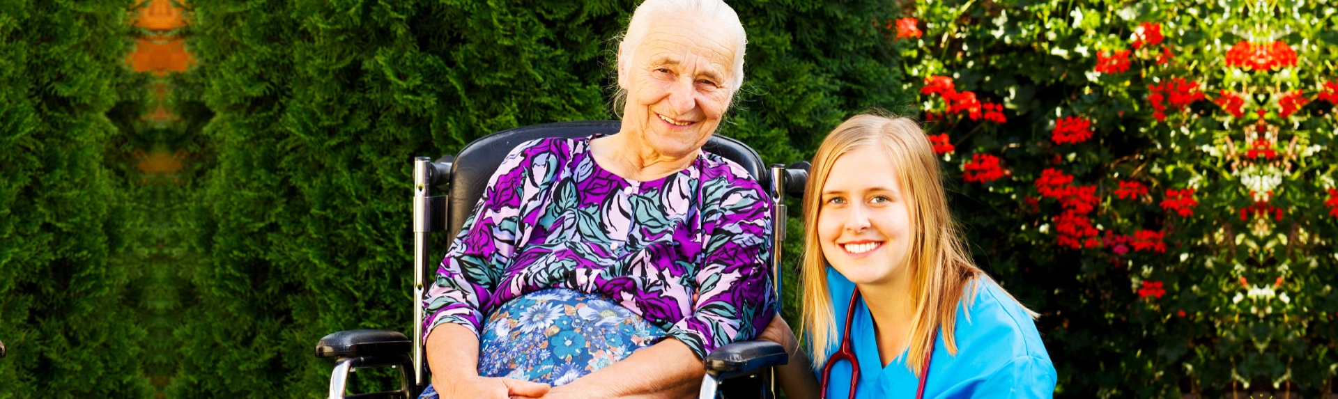 young nurse with her patient in the garden