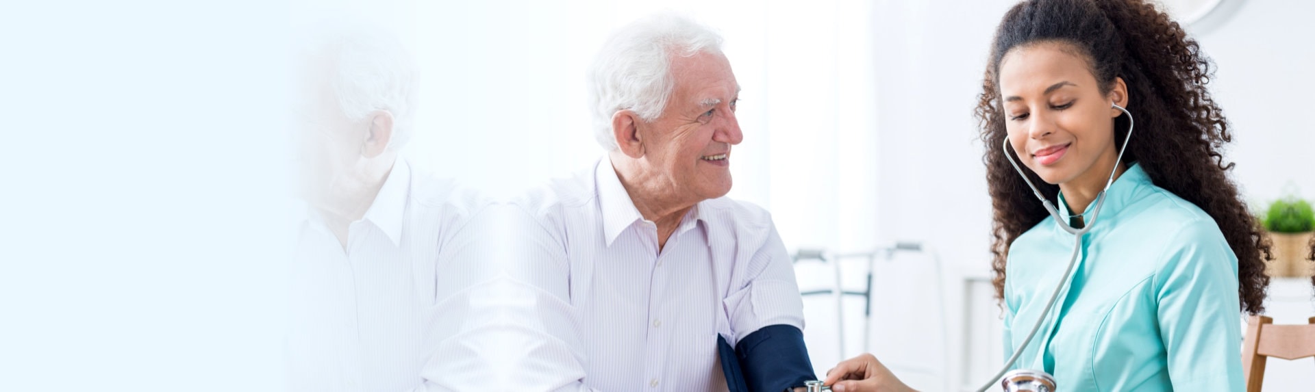 nurse monitoring his patient blood pressure