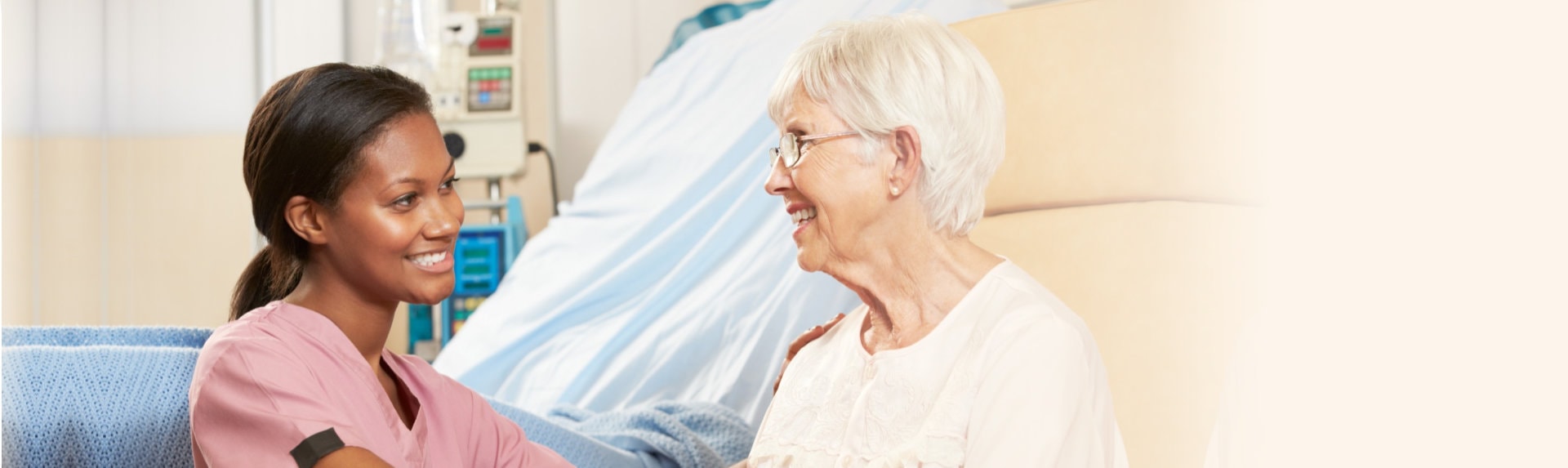 caregiver with her patient having a conversation